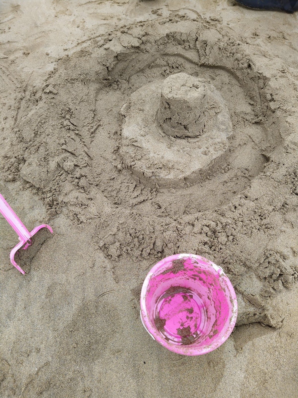 bucket and spade on sand